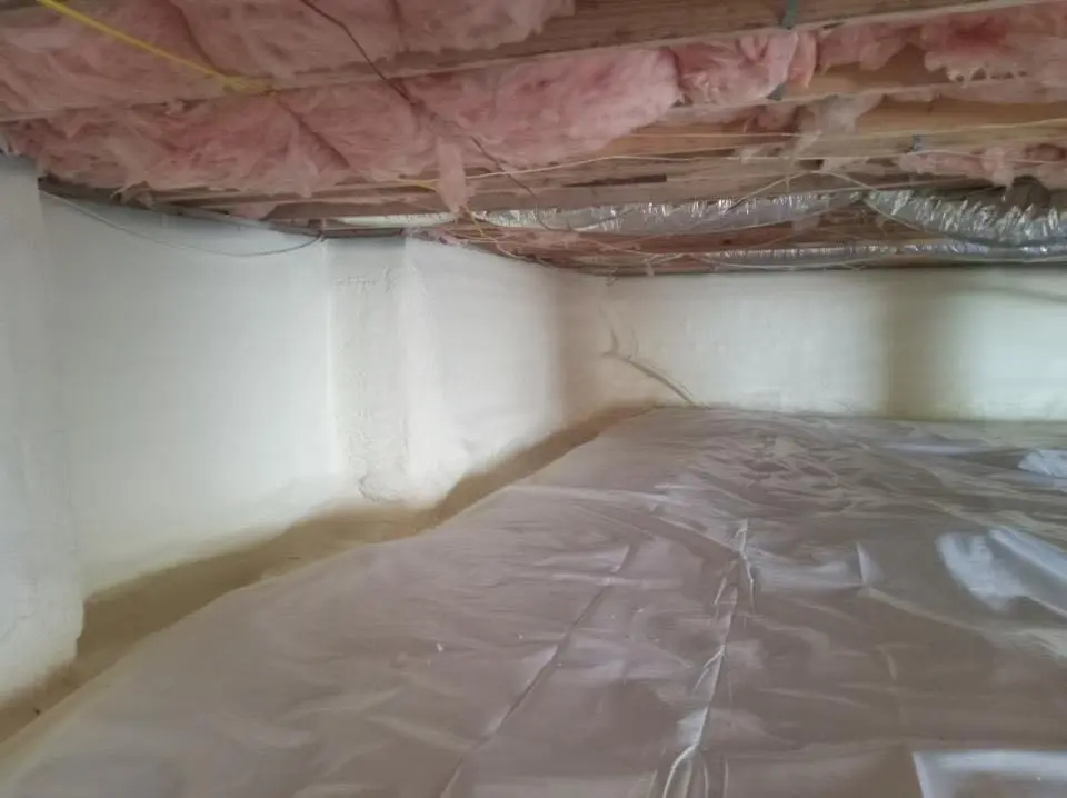 Crawl space encapsulation with closed-cell spray foam for Storm Damage Roof Repair in Oxford